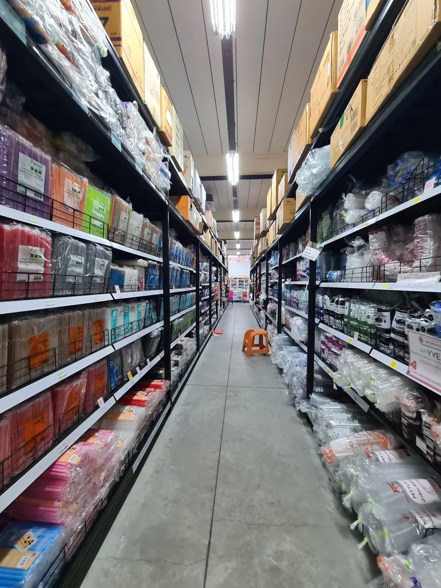 Colorful bags, cups, and packaging supplies inside the store